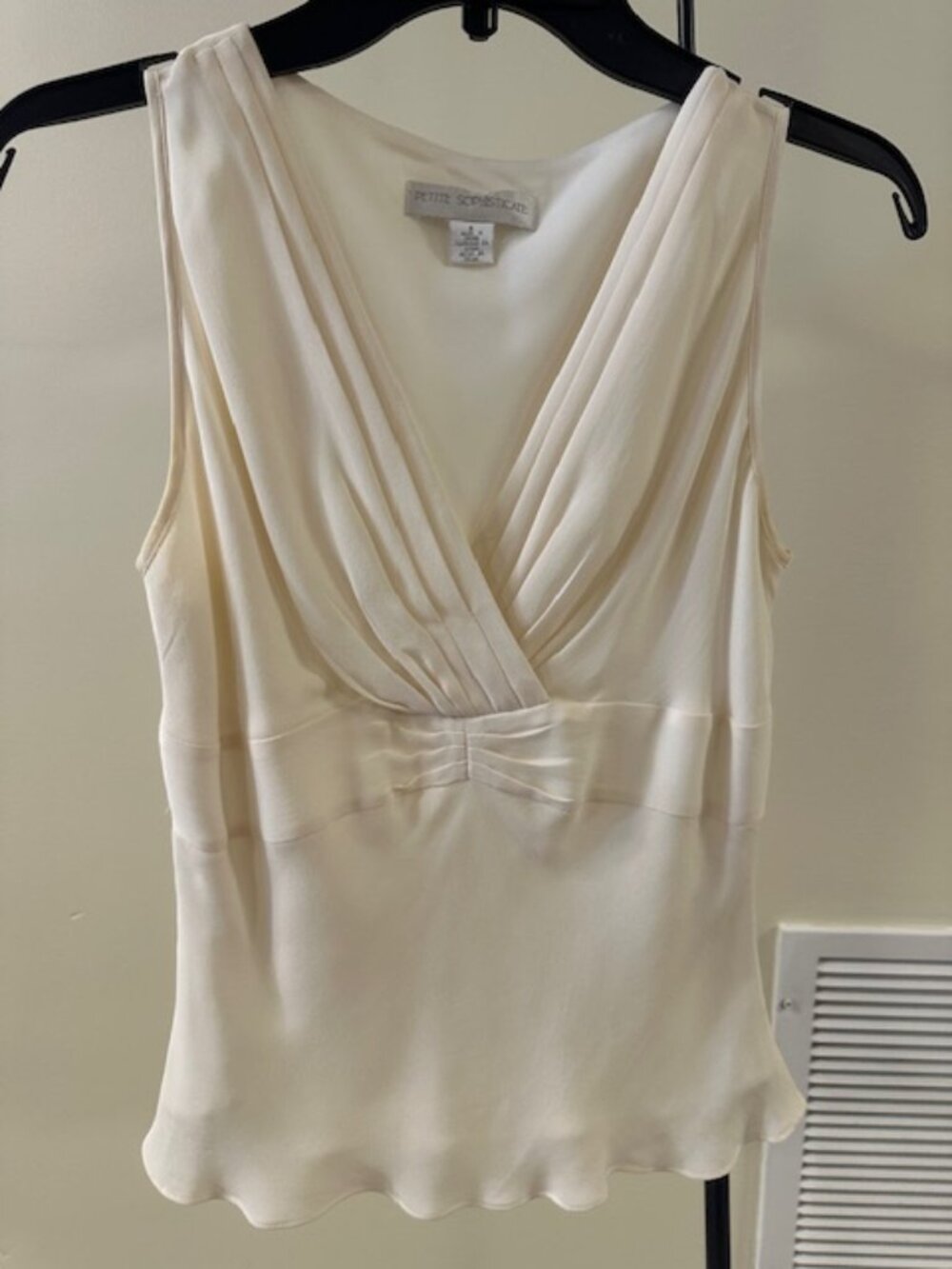 Cream sleeveless top